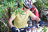 mountain bikers in rural landscape