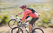 Blurred view of mountain bikers