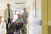 Doctor and nurse with older patient
