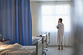 Patient talking on cell phone room