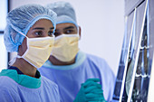 Surgeons examining x-rays room