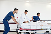 Hospital staff rushing patient