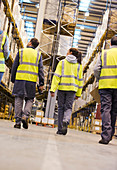 Workers walking in warehouse