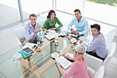 Business people smiling in meeting