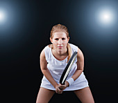 Tennis player poised in game