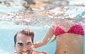 Couple playing in swimming pool