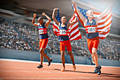 American athletes celebrating on track