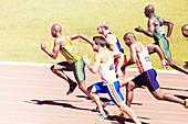 Sprinters racing on track