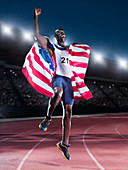 Runner holding flag and celebrating