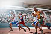 Relay runners racing on track