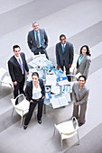 Smiling business people at table