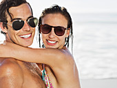 Smiling couple on beach