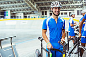 Portrait of track cyclist in velodrome