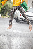 Barefoot woman running