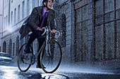 Enthusiastic businessman riding bicycle