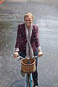 Happy woman riding bicycle