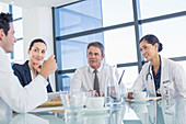 Doctors talking in meeting