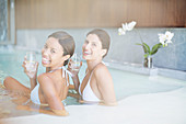 Portrait of smiling women in spa pool
