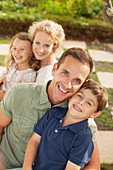 Portrait of smiling family outdoors