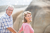 Older couple walking outdoors