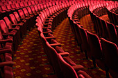 Seats in empty theatre auditorium