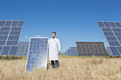 Scientist holding solar panel
