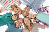 Family smiling together outdoors