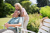 Senior couple relaxing in backyard