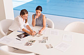 Businesswomen meeting at conference table