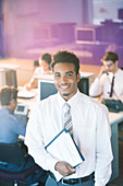 Businessman smiling in office