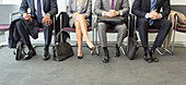 Business people sitting in waiting area