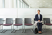 Businesswoman sitting in waiting area