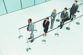 Business people waiting in line