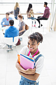 University student smiling in lounge