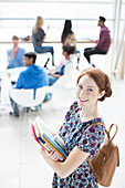 University student smiling in lounge