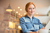 Woman holding menu in cafe