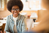 Woman smiling in cafe