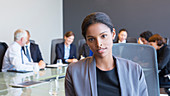 Business woman sitting in meeting