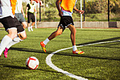 Soccer players training on field