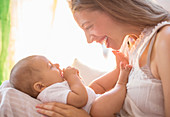 Mother holding baby boy