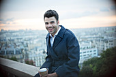 Businessman drinking coffee in Paris
