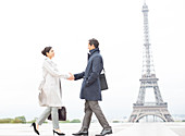 Business people shaking hands in Paris