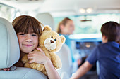 Happy girl with teddy bear