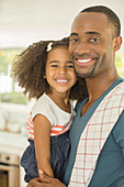 Portrait of smiling father and daughter