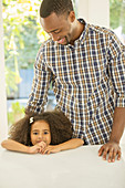 Portrait of smiling girl with father