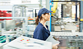Worker walking in food processing plant
