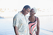 Senior couple walking on beach