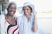 Portrait of smiling women at beach