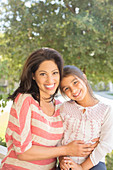 Portrait of smiling mother and daughter