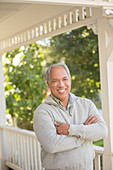 Portrait of smiling man on porch